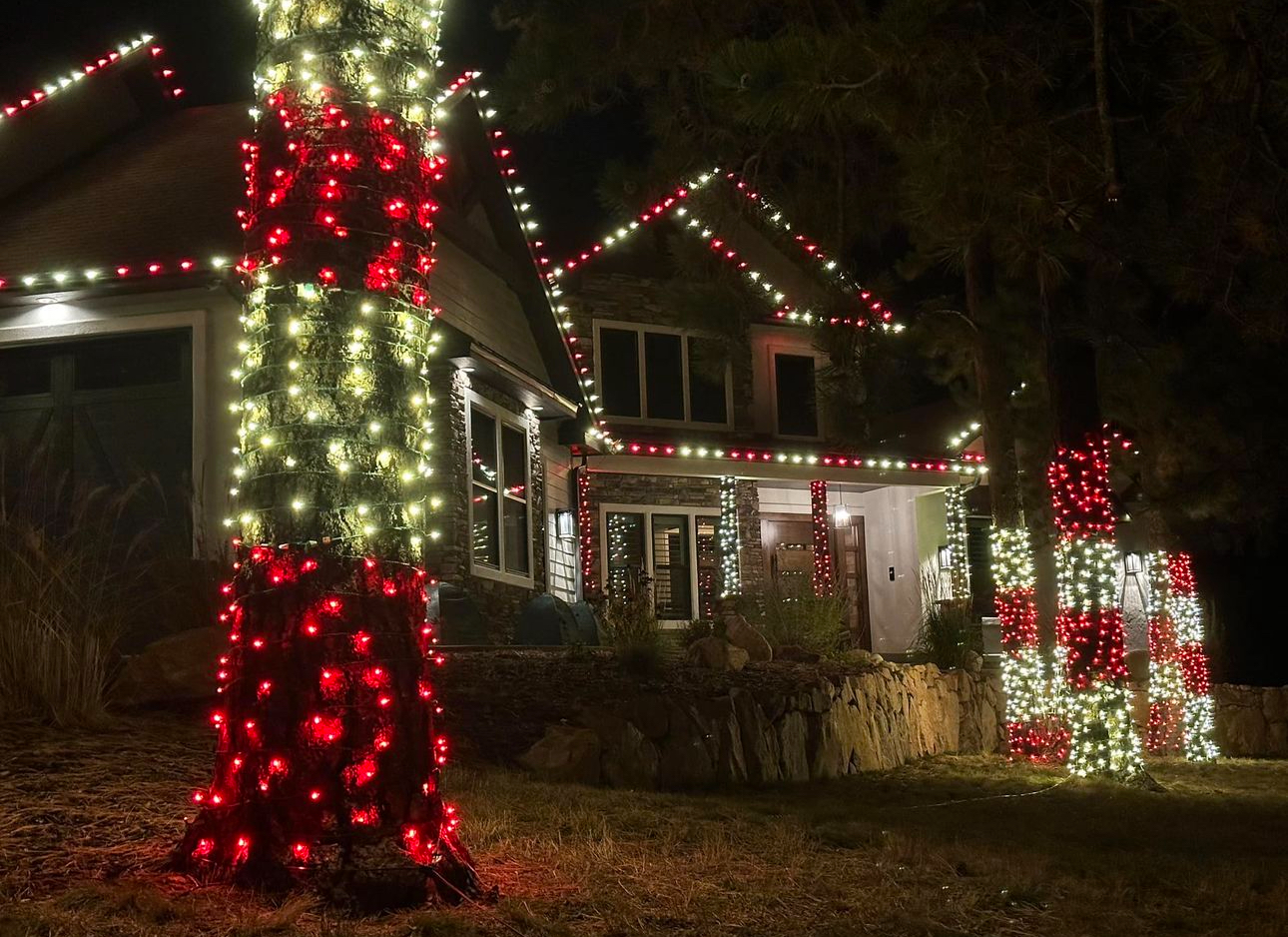 Wrapped trees with red and white lights
